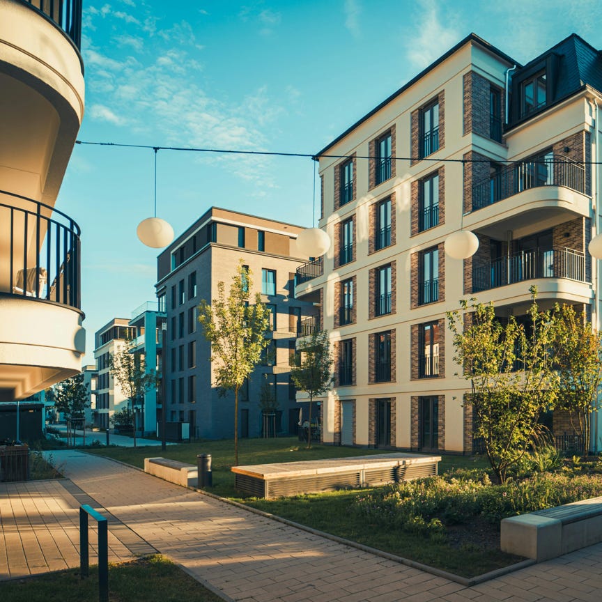 A modern apartment building with balconies and balconies